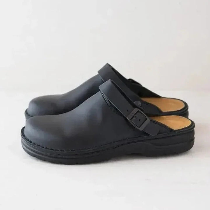 Indoor men's genuine leather slippers, providing orthotic support & relief for daily wear.