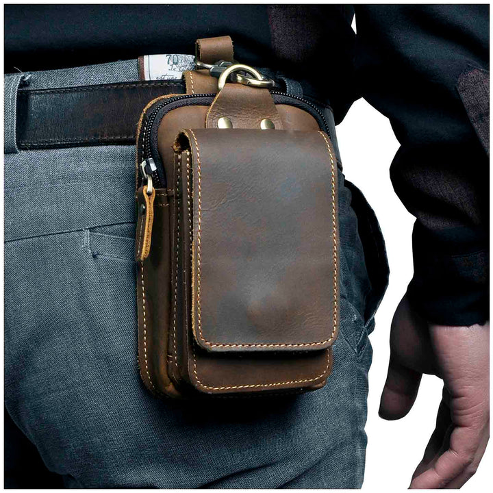 Men's genuine leather waist pack in dark brown, perfect for travel essentials