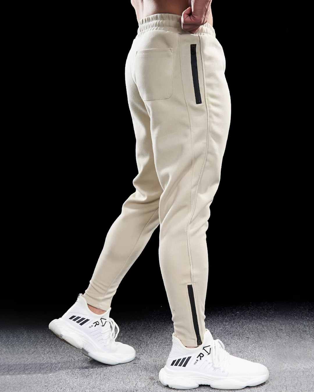 Men's Girona track pants. Comfortable loungewear & sportswear with practical zip hems & tapered fit.