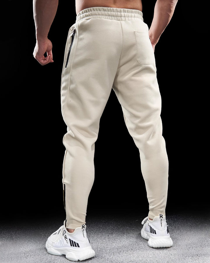 Men's Girona athletic joggers, featuring zip hems. Tapered fit for ultimate comfort in sportswear & loungewear.