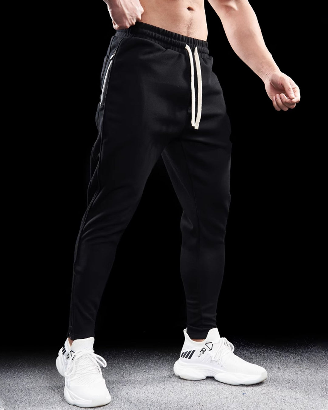 Everyday men's Girona Zip Joggers. Stylish tapered fit sweatpants with practical zip hems for active comfort.