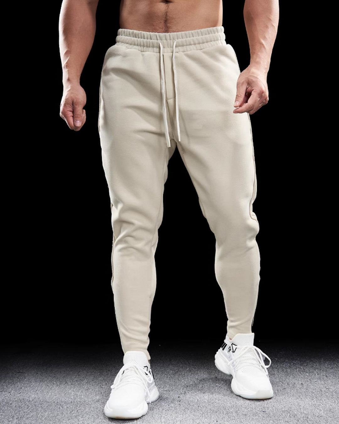 Stylish men's Girona tapered fit joggers. Versatile sweatpants with zip hems for activewear & daily comfort.