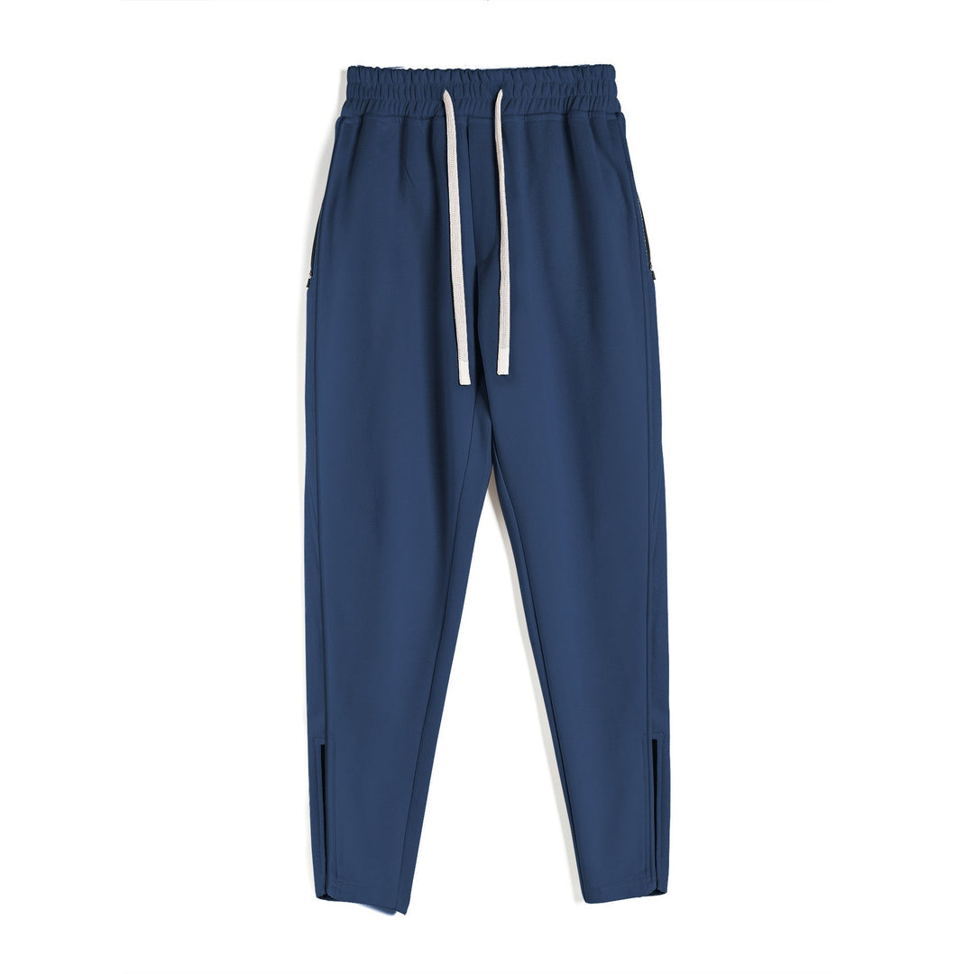 Active men's Girona casual pants with zip hems. Tapered fit joggers for athletic performance & everyday fashion.