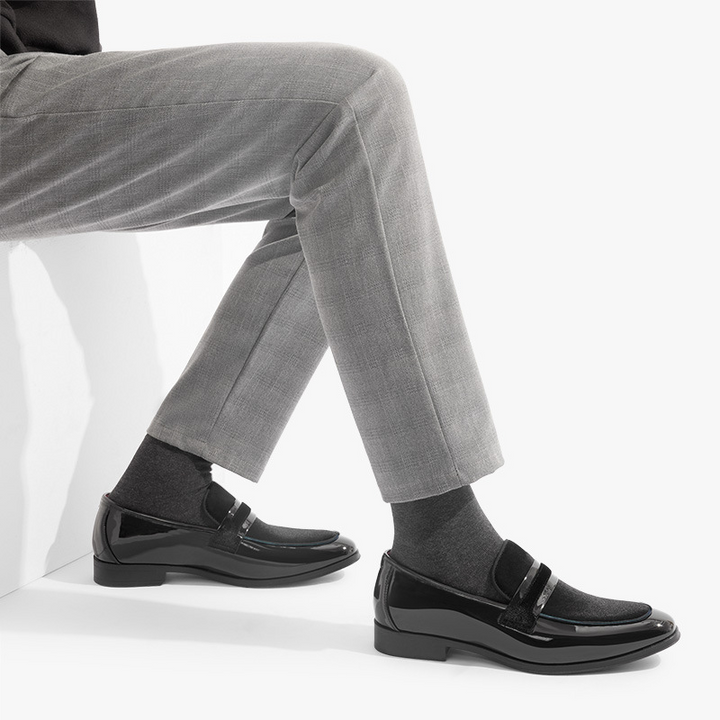 Stylish navy glossy dress loafers for men, ideal formal slip-on footwear for modern occasion wear.
