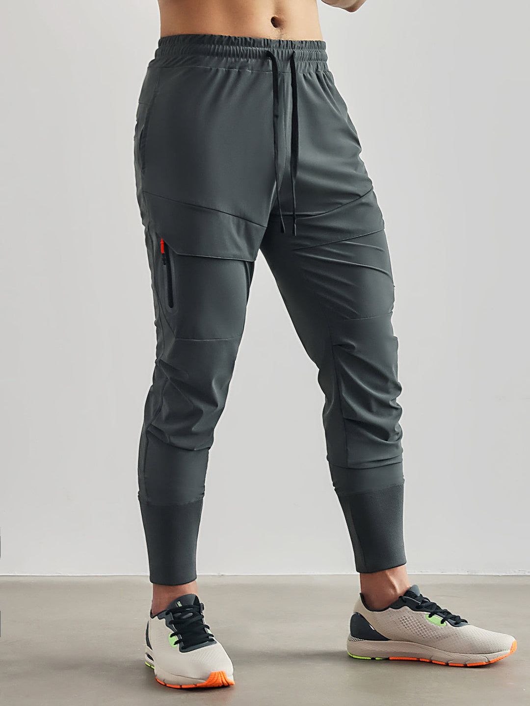 Close-up of utility pockets on Men's Granada Cargo Joggers, highlighting practical functionality.