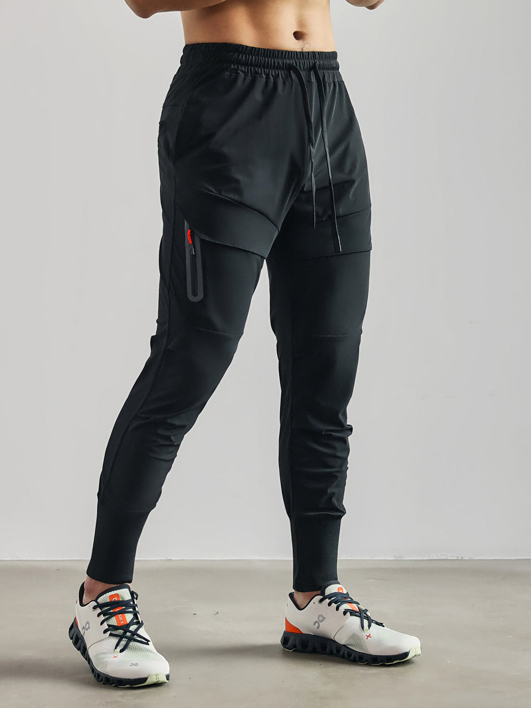 Versatile men's cargo pants with multiple utility pockets, perfect for street style, activewear & comfort.