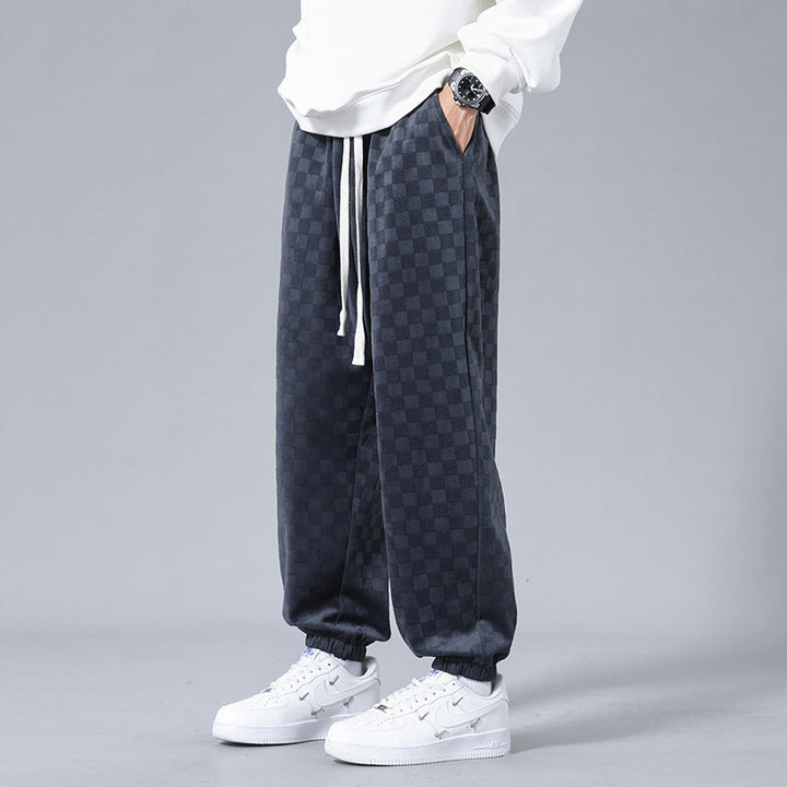 Men's gray & black checkerboard sweatpants for elevated street style. Relaxed fit casual pants.