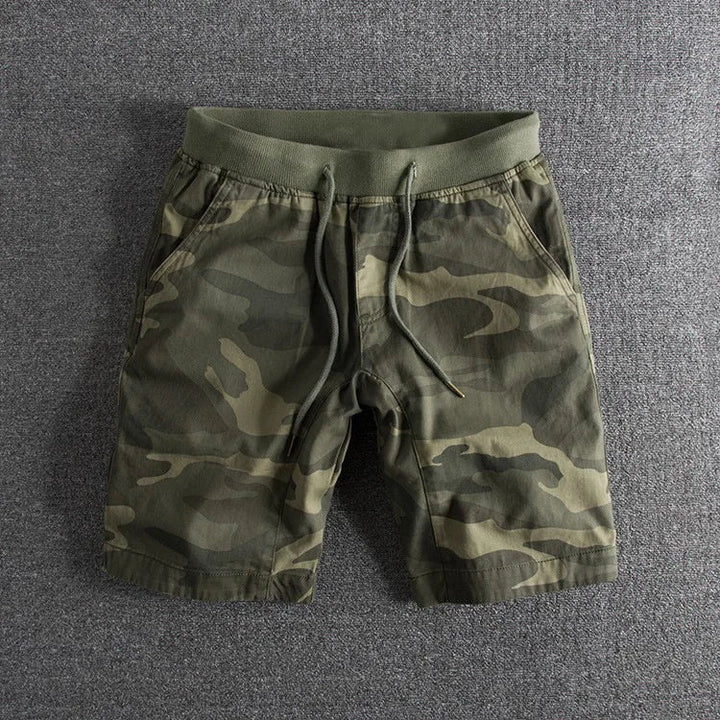 Men's gray camo tactical shorts for outdoor adventures & casual wear. Durable, comfortable summer military shorts.