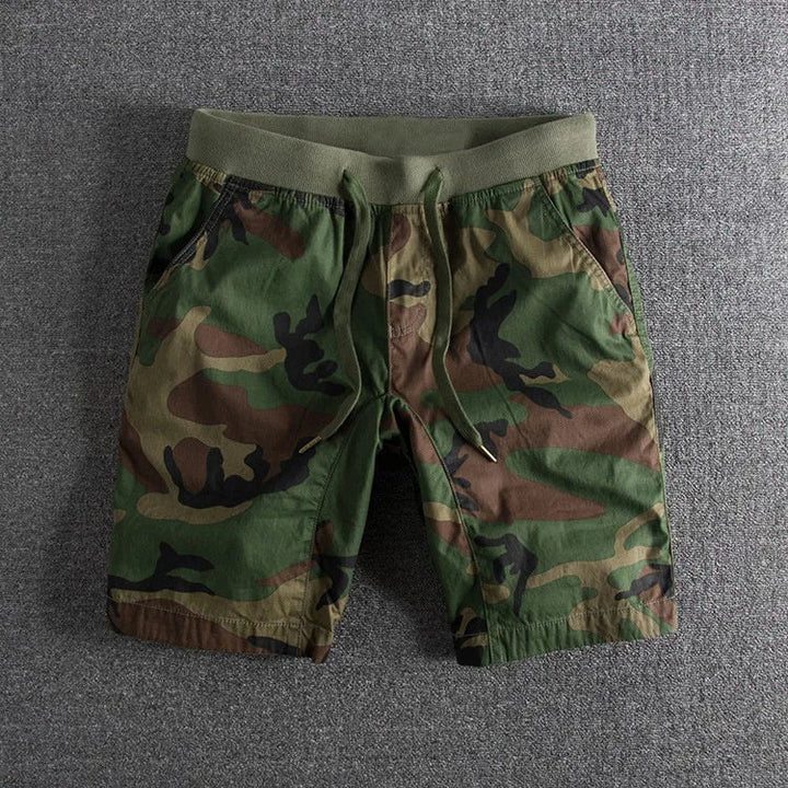 Comfortable men's camo shorts for tactical outdoor activities & everyday casual wear. Versatile active summer fashion.