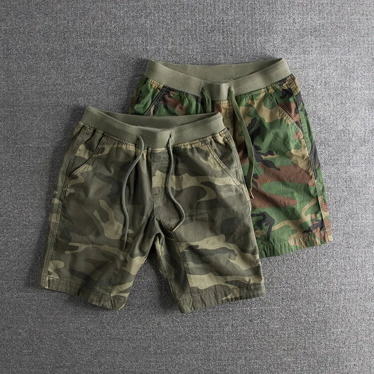 Durable men's tactical camo shorts, perfect for outdoor activities & active wear. Stylish & comfortable summer shorts.