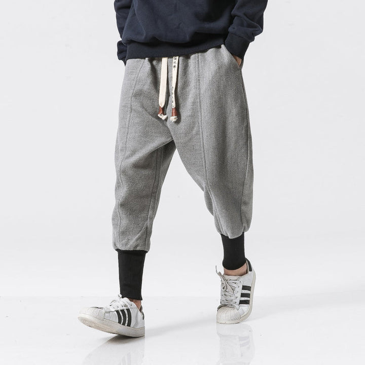 Men's gray relaxed fit tapered pants, perfect for casual everyday comfort and modern style.