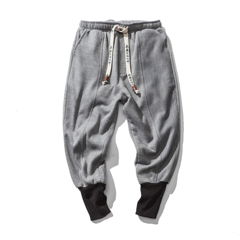 Soft gray men's relaxed fit tapered pants, offering everyday comfort and stylish, versatile appeal.