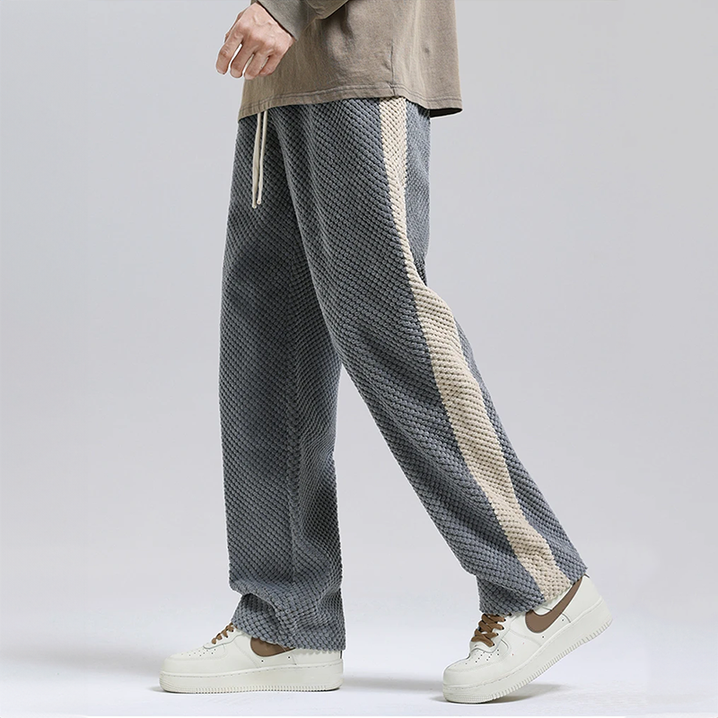 Men's gray waffle corduroy joggers for stylish urban comfort & streetwear. New arrival casual pants.