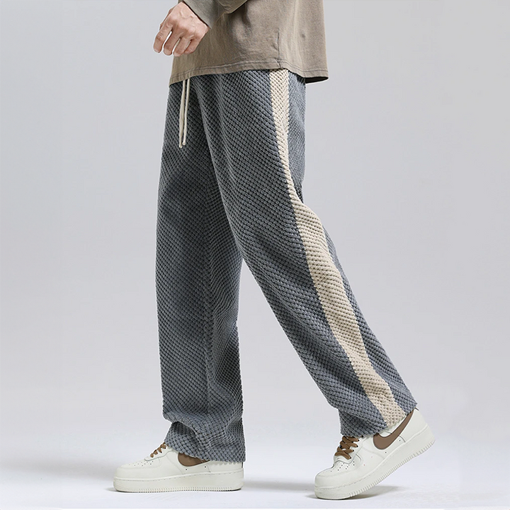 Men's gray waffle corduroy joggers for stylish urban comfort & streetwear. New arrival casual pants.