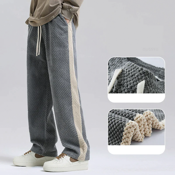 Comfortable black men's waffle corduroy lounge joggers, ideal for casual wear, relaxation & urban style.