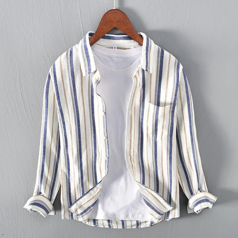 Stylish men's blue striped button-up shirt, relaxed fit, lightweight long sleeve for casual spring wear.