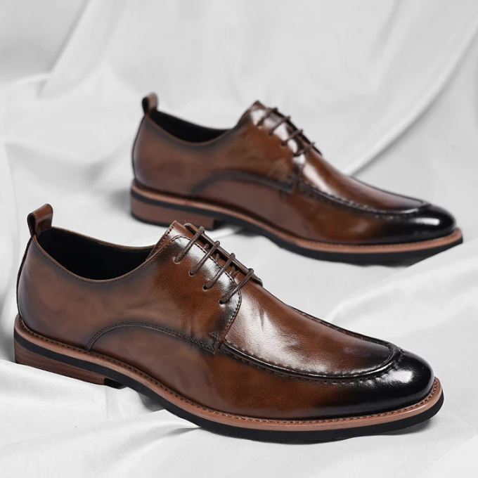 Stylish men's hand-burnished Oxford shoes, perfect professional footwear for any formal occasion.