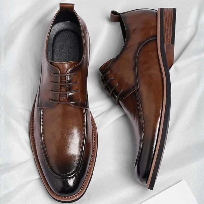 High-quality men's hand-burnished Oxford shoes, ideal for smart casual or professional business attire.