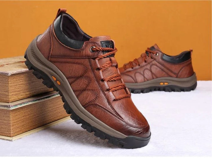 Side profile of men's casual footwear, showcasing excellent arch support and breathable construction.