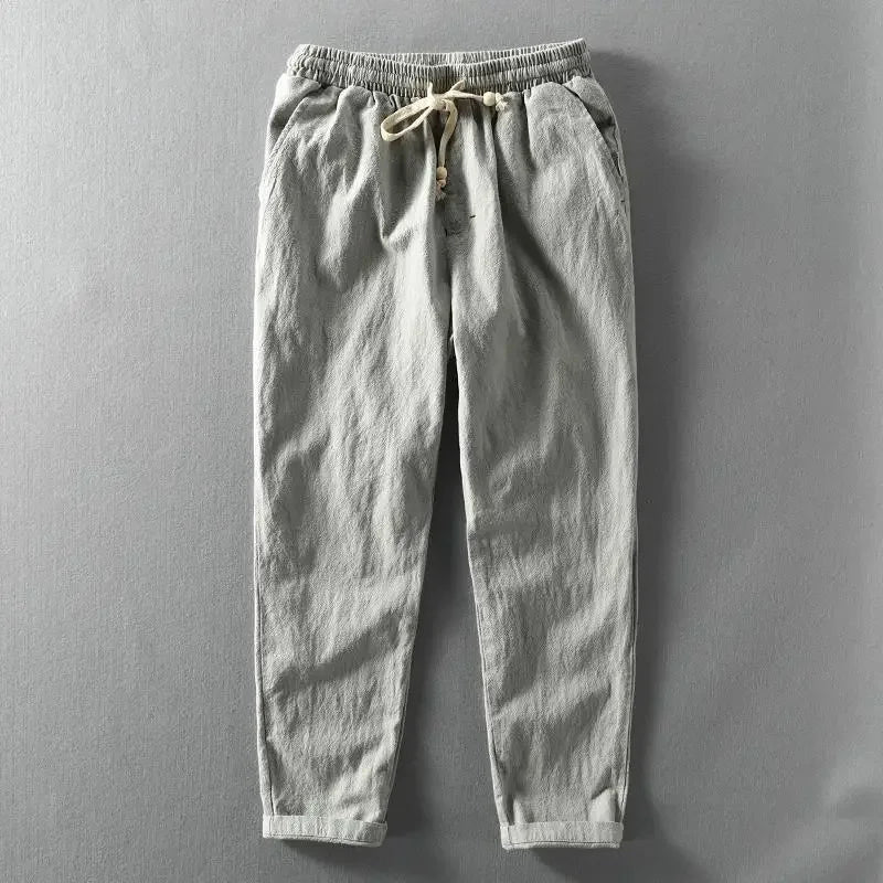 Men's casual Harajuku linen trousers, drawstring waist & tapered leg for a relaxed fit.