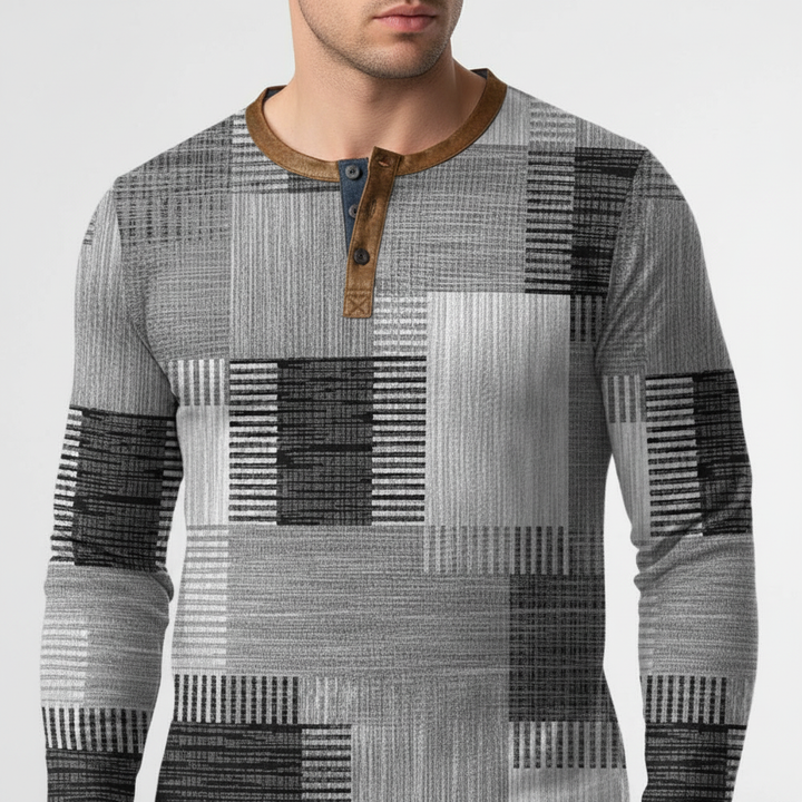 Folded men's cotton knit sweater, long sleeve, showing the soft fabric and casual design.