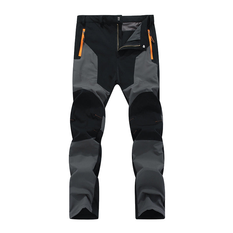 Durable men's waterproof work pants with reinforced knees & comfort fit for heavy-duty outdoor utility tasks.