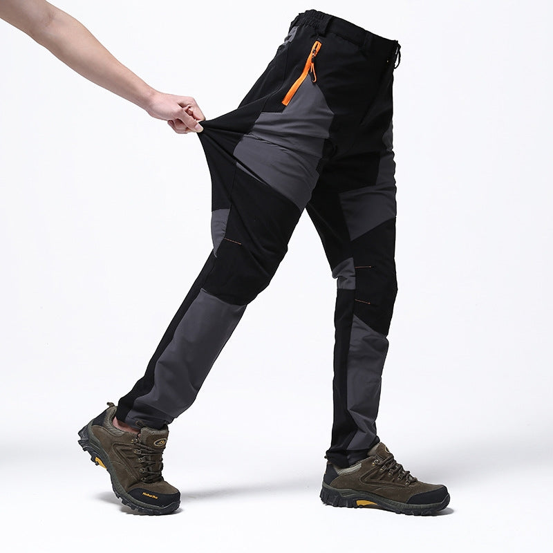 Warm men's waterproof rain gear work pants, heavy-duty and durable for harsh winter outdoor conditions.