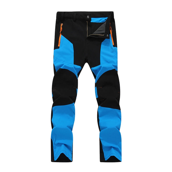 Rugged men's waterproof work pants, reinforced & warm, offering durable protection for demanding outdoor jobs.