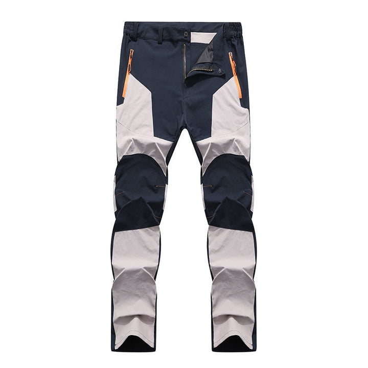 Stay dry & warm in these men's heavy-duty waterproof work pants. Durable, reinforced, perfect for winter outdoor work.