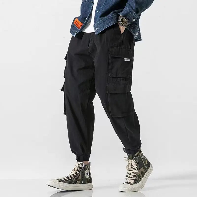 Heavyweight men's tapered cargo pants, made from durable cotton, offering a cool jogger style.