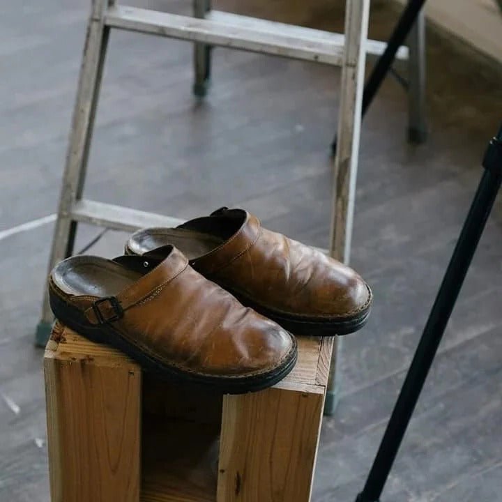 Men's heel strap slip-on mules, designed for all-day comfort. Versatile casual footwear for indoor and outdoor use.