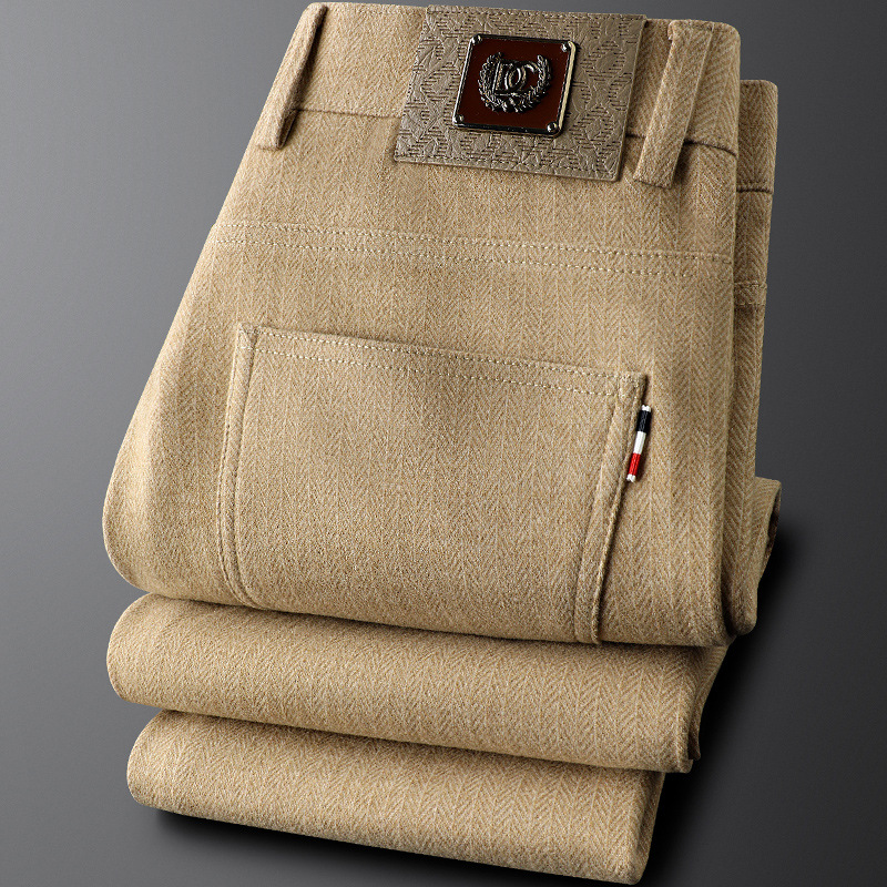 Stylish men's gray tailored trousers, classic fit, perfect dress pants for professional or casual outfits.