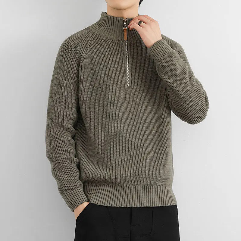 Man wearing a versatile Men's Heritage Half-Zip Sweater, perfect long sleeve casual menswear for everyday fall fashion.