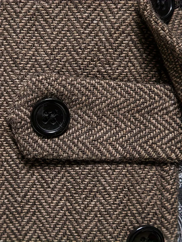 Classic herringbone blazer for men, offering a refined and sophisticated smart casual look.
