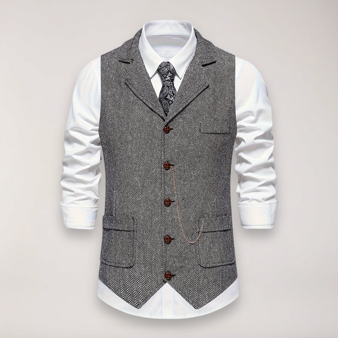 Classic fit men's herringbone dress vest, showcasing tailored silhouette & elegant style for refined formal wear.