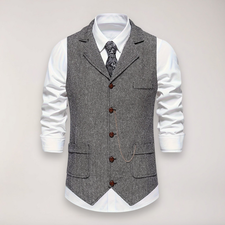 Classic fit men's herringbone dress vest, showcasing tailored silhouette & elegant style for refined formal wear.