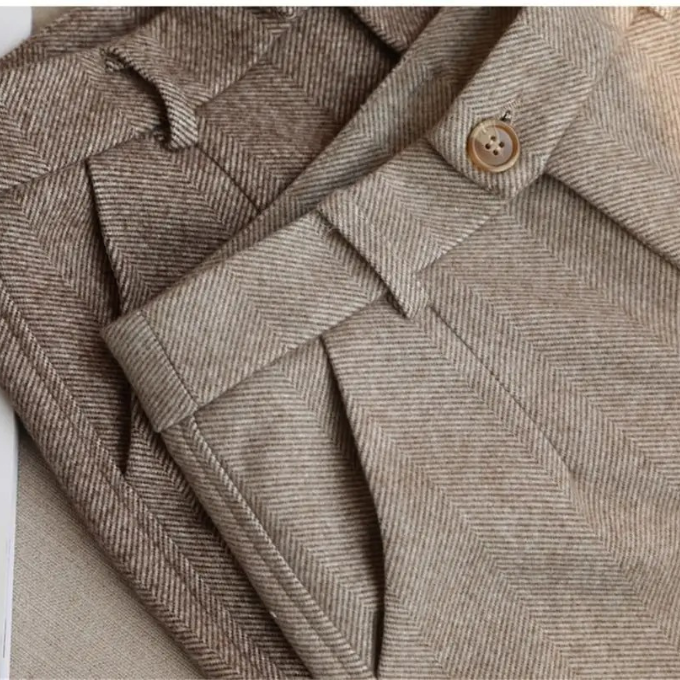 Elegant men's herringbone wool trousers, suitable for office, business meetings, or formal events.