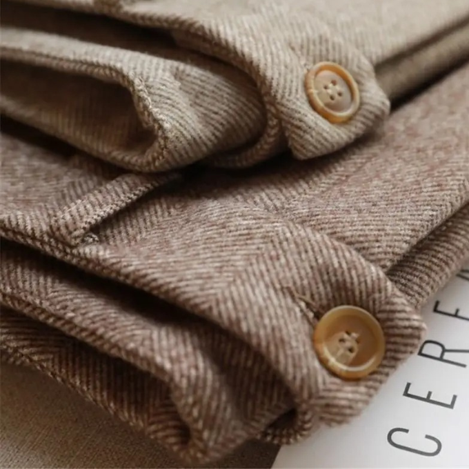 Premium men's herringbone wool dress trousers, offering a tailored, classic, and comfortable fit.