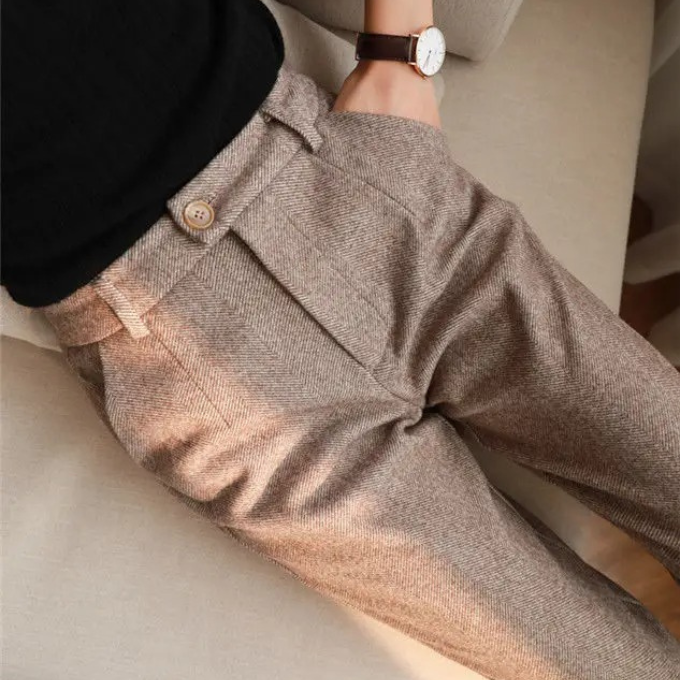 Comfortable men's wool herringbone trousers, ideal for tailored business wear and classic style.