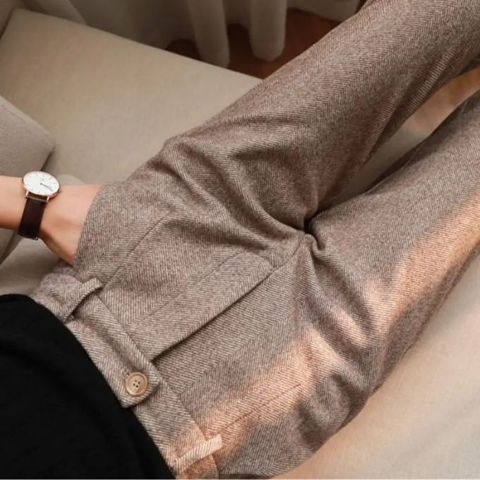 Versatile men's classic wool herringbone trousers, suitable for formal and business attire.