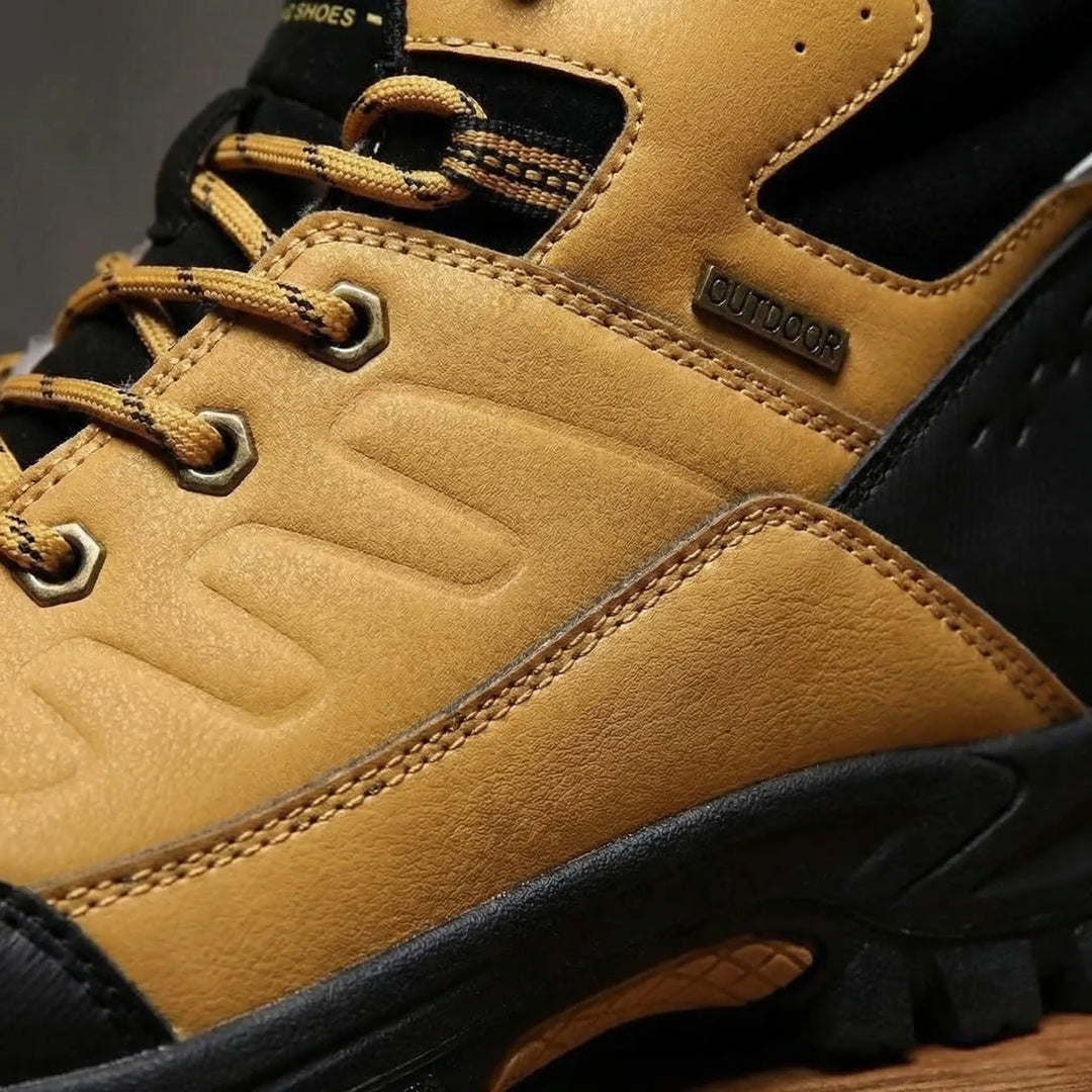 Rugged men's winter hiking boots providing warmth & ankle support. Perfect for challenging outdoor adventures.