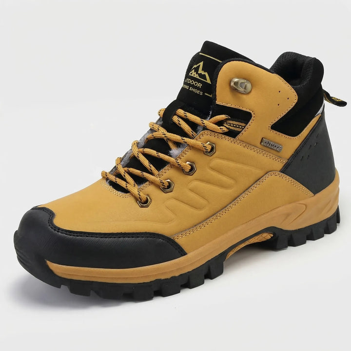Premium men's winter hiking boots, high-top for ankle support & warmth on outdoor cold weather trails.