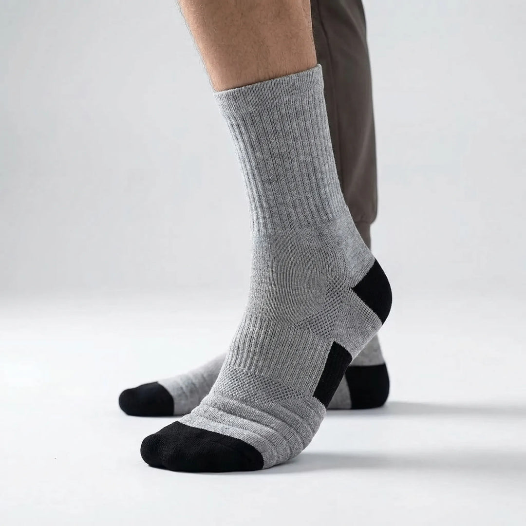 Athletic men's high-tube compression socks, moisture-wicking for basketball, training & workouts.