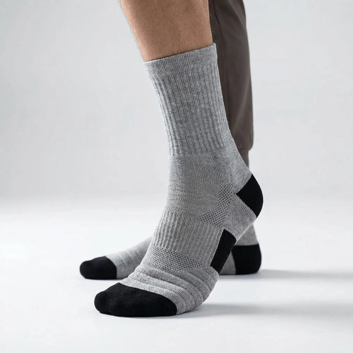 Athletic men's high-tube compression socks, moisture-wicking for basketball, training & workouts.