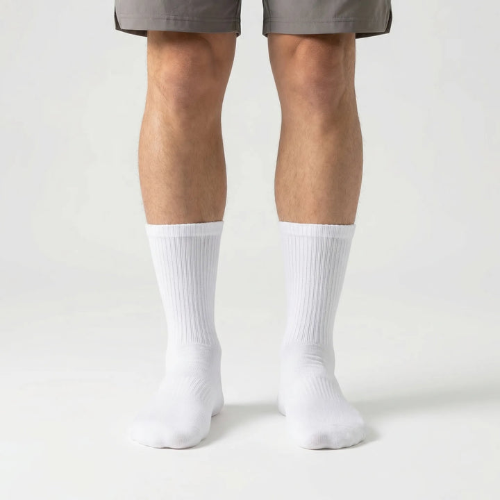 Durable men's high-tube compression sports socks (3-pack), essential workout gear for athletes.