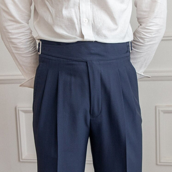 Side profile of men's high-waist Gurkha pants, showing the elegant silhouette.