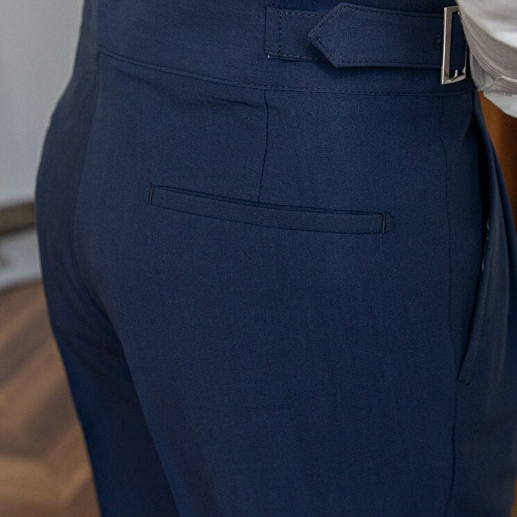 Men's business attire: high-waist Gurkha pants paired with a blazer, professional look.