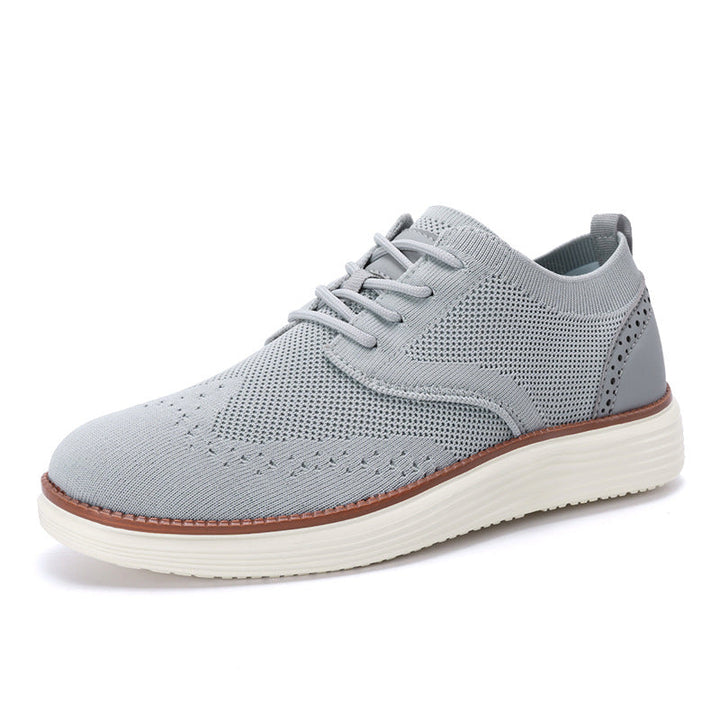 Holt men's active walking shoes on a path, showcasing their lightweight and breathable design for travel.