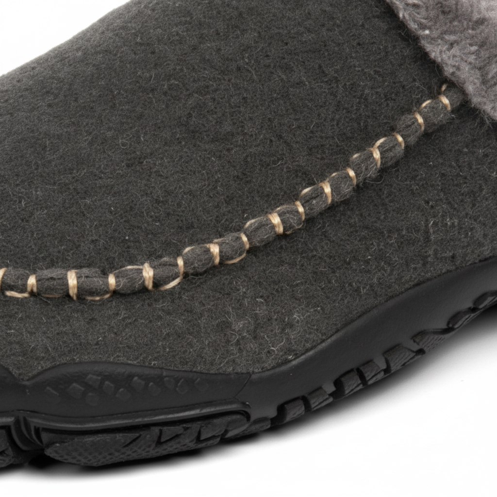 Close-up of the warm, breathable lining inside men's HomeStride cozy slippers.