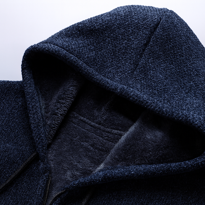 Warm men's winter overcoat, cozy hooded jacket ideal for urban cold weather protection.